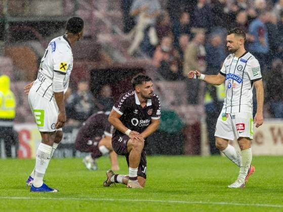 dejection for Claudio Braga of Heart of Midlothian at full time during the Hearts v Sturm Graz second leg of their Champions League second qualifying round at Tynecastle Stadium on Tuesday 28th July 2026 Heart of Midlothian v Sturm Graz, UEFA Champions League, 2nd Qualifying Round, 2nd Leg, Football, Tynecastle Park, Edinburgh, Scotland, UK - 28 Jul 2026Edinburgh Tynecastle Park Scotland United Kingdom  Copyright: xAlanxRennie Shutterstockx 17015998ca
