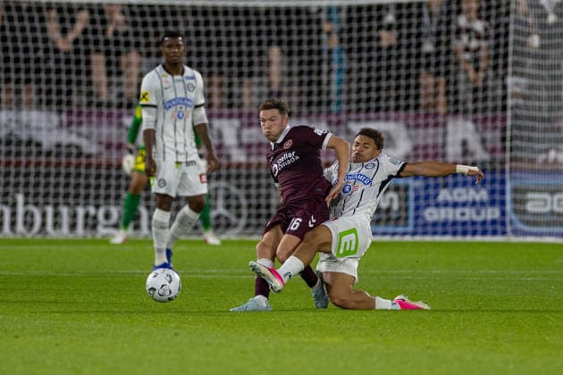 RECORD DATE NOT STATED 28th July 2026; Tynecastle Park, Edinburgh, Scotland: UEFA Europa League Qualifier Football, Hearts versus Sturm Graz; Jacob Hodl of Sturm Graz tackles Blair Spittal of Heart of Midlothian VagelisxGeorgariou