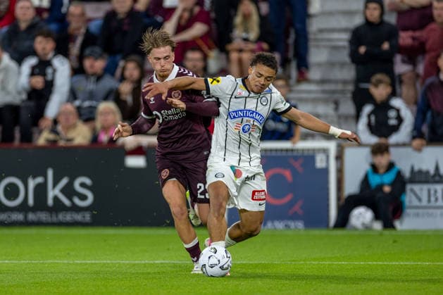 RECORD DATE NOT STATED 28th July 2026; Tynecastle Park, Edinburgh, Scotland: UEFA Europa League Qualifier Football, Hearts versus Sturm Graz; Jordi Altena of Heart of Midlothian tackles Jacob Hodl of Sturm Graz VagelisxGeorgariou