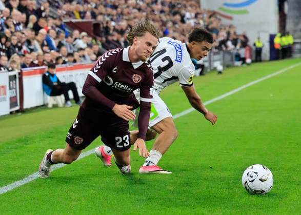 Heart of Midlothian v SK Sturm Graz UEFA Champions League Jordi Altena of Heart of Midlothian is fouled by Jacob Peter Hödl of SK Sturm Graz during the UEFA Champions League Second Qualifying Round Second Leg match at Tynecastle Park, Edinburgh 28 07 2026 UK Newspapers OUT Copyright: xFredxPalmerx FIL-23686-0130