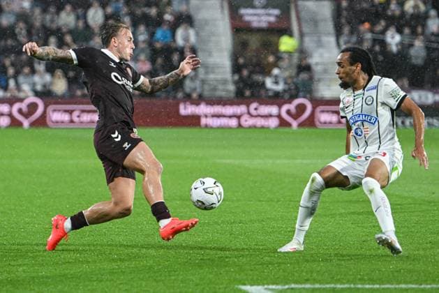 Heart of Midlothian v SK Sturm Graz UEFA Champions League Calvin Miller of Heart of Midlothian and Jon Gorenc Stankovic of SK Sturm Graz during the UEFA Champions League Second Qualifying Round Second Leg match at Tynecastle Park, Edinburgh 28 07 2026 UK Newspapers OUT Copyright: xJamiexJohnstonx FIL-23685-0088