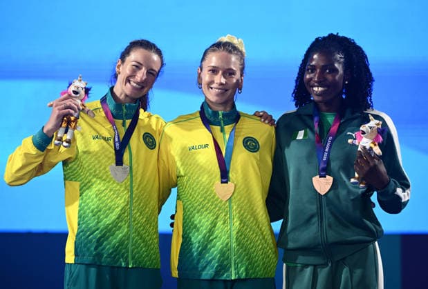 COM26 ATHLETICS, Gold medalist Eleanor Patterson of Australia , Silver medalist Nicola Olyslagers and Bronze medalist Temitope Simbiat Adeshina, of Nigeria pose during the medal ceremony for the Women™s High Jump during the Glasgow 2026 Commonwealth Games at Scotstoun Stadium in Glasgow, Scotland, Tuesday, July 28, 2026. ( NO ARCHIVING, EDITORIAL USE ONLY Glasgow United Kingdom  Copyright: xJOELxCARRETTx 20260729197062852689
