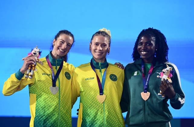 COM26 ATHLETICS, Gold medalist Eleanor Patterson of Australia , Silver medalist Nicola Olyslagers and Bronze medalist Temitope Simbiat Adeshina, of Nigeria pose during the medal ceremony for the Women™s High Jump during the Glasgow 2026 Commonwealth Games at Scotstoun Stadium in Glasgow, Scotland, Tuesday, July 28, 2026. ( NO ARCHIVING, EDITORIAL USE ONLY Glasgow United Kingdom  Copyright: xJOELxCARRETTx 20260729115190523756