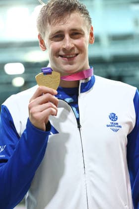 July 28, 2026, Glasgow, Scotland, Great Britain: STEPHEN CLEGG of Scotland poses with his gold medal won in the Swimming Men s 50m Freestyle SB13 Final of the Commonwealth Games Glasgow 2026 at the Tollcross International Swimming Centre in Glasgow, Scotland. Glasgow Great Britain - ZUMAc179 20260728_zep_c179_006 Copyright: xMickaelxChavetx