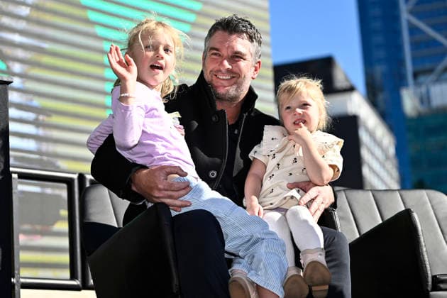 Ryan Fox with daughters Isobel and Margo on stage during the Public welcome home celebration for New Zealand golfer Ryan Fox on bringing the Claret Jug home after his historic Open Championship win. Takutai Square, Auckland, New Zealand on Tuesday 28 July 2026. Photo: Alan Lee Auckland New Zealand Copyright: xAlanxLeex xPhotosportx