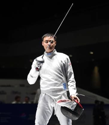 Fechten, WM in Hongkong #2 (260729) -- HONG KONG, July 29, 2026 -- Lan Minghao (R) of China reacts during the team men s epee round of 16 match between China and Switzerland at the 2026 Fencing World Championships in Hong Kong, south China, July 29, 2026. ) (SP)CHINA-HONG KONG-FENCING-WORLD CHAMPIONSHIPS-MEN S EPEE TEAM (CN) LoxPingxFai 