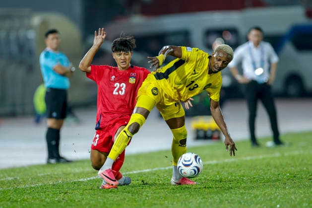 July 28, 2026, Kuala Lumpur, Malaysia: Mohamadou Sumareh of Malaysia (R) and Phonsak Seesavath of Laos seen in action during the ASEAN Hyundai Cup 2026 match between Malaysia and Laos at Kuala Lumpur Football Stadium, Cheras. Final score; Malaysia 4:0 Laos. Kuala Lumpur Malaysia - ZUMAs197 20260728_aaa_s197_291 Copyright: xWongxFokxLoyx
