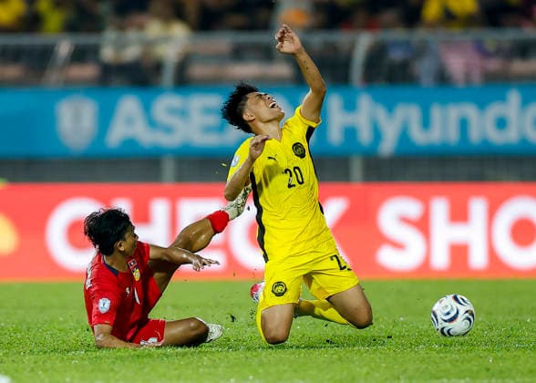 July 28, 2026, Kuala Lumpur, Malaysia: Muhammad Syafiq Bin Ahmad of Malaysia (R) and Chanthavixay Khounthoumphone of Laos seen in action during the ASEAN Hyundai Cup 2026 match between Malaysia and Laos at Kuala Lumpur Football Stadium, Cheras. Final score; Malaysia 4:0 Laos. ASEAN Hyundai Cup 2026 Malaysia Vs Laos In Kuala Lumpur, Malaysia - 28 Jul 2026  - ZUMAs197 20260728_aaa_s197_292 Copyright: xWongxFokxLoyx
