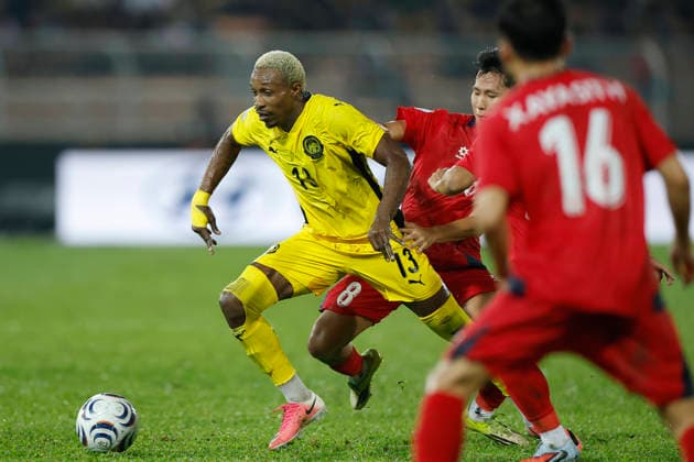 July 28, 2026, Kuala Lumpur, Malaysia: Mohamadou Sumareh of Malaysia (L) and Damoth Thongkhamsavath of Laos seen in action during the ASEAN Hyundai Cup 2026 match between Malaysia and Laos at Kuala Lumpur Football Stadium, Cheras. Final score; Malaysia 4:0 Laos. Kuala Lumpur Malaysia - ZUMAs197 20260728_aaa_s197_296 Copyright: xWongxFokxLoyx