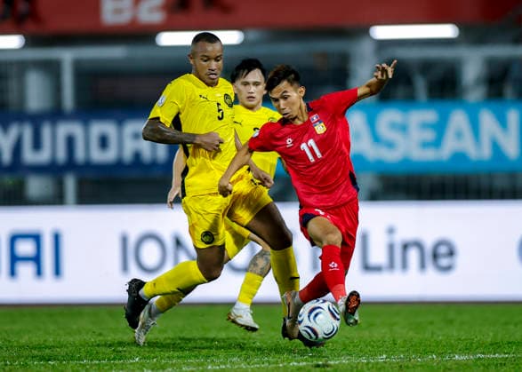 July 28, 2026, Kuala Lumpur, Malaysia: Rodney Celvin Akwensivie of Malaysia (L) and Chony Waenpaserth of Laos seen in action during the ASEAN Hyundai Cup 2026 match between Malaysia and Laos at Kuala Lumpur Football Stadium, Cheras. Final score; Malaysia 4:0 Laos. Kuala Lumpur Malaysia - ZUMAs197 20260728_aaa_s197_298 Copyright: xWongxFokxLoyx