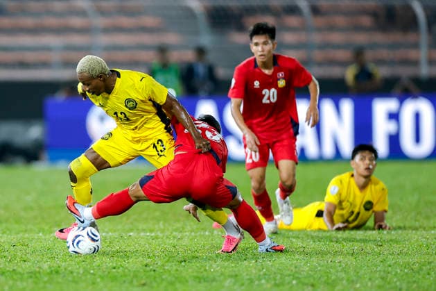 July 28, 2026, Kuala Lumpur, Malaysia: Mohamadou Sumareh of Malaysia (L) and Phonsak Seesavath of Laos seen in action during the ASEAN Hyundai Cup 2026 match between Malaysia and Laos at Kuala Lumpur Football Stadium, Cheras. Final score; Malaysia 4:0 Laos. Kuala Lumpur Malaysia - ZUMAs197 20260728_aaa_s197_301 Copyright: xWongxFokxLoyx