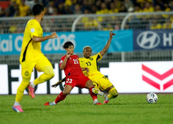 July 28, 2026, Kuala Lumpur, Malaysia: Phonsak Seesavath of Laos (C) and Mohamadou Sumareh of Malaysia seen in action during the ASEAN Hyundai Cup 2026 match between Malaysia and Laos at Kuala Lumpur Football Stadium, Cheras. Final score; Malaysia 4:0 Laos. ASEAN Hyundai Cup 2026 Malaysia Vs Laos In Kuala Lumpur, Malaysia - 28 Jul 2026  - ZUMAs197 20260728_aaa_s197_308 Copyright: xWongxFokxLoyx