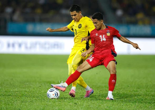 July 28, 2026, Kuala Lumpur, Malaysia: Kouaycheng Nouphakdy of Laos (R) and Muhammed Ubaidullah Bin Shamsul Fazili of Malaysia seen in action during the ASEAN Hyundai Cup 2026 match between Malaysia and Laos at Kuala Lumpur Football Stadium, Cheras. Final score; Malaysia 4:0 Laos. ASEAN Hyundai Cup 2026 Malaysia Vs Laos In Kuala Lumpur, Malaysia - 28 Jul 2026  - ZUMAs197 20260728_aaa_s197_311 Copyright: xWongxFokxLoyx
