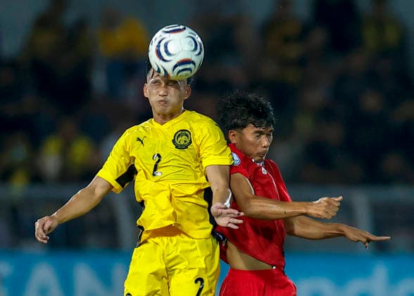 July 28, 2026, Kuala Lumpur, Malaysia: Jimmy Raymond of Malaysia (L) and Soukphachan Lueanthala of Laos seen in action during the ASEAN Hyundai Cup 2026 match between Malaysia and Laos at Kuala Lumpur Football Stadium, Cheras. Final score; Malaysia 4:0 Laos. Kuala Lumpur Malaysia - ZUMAs197 20260728_aaa_s197_310 Copyright: xWongxFokxLoyx