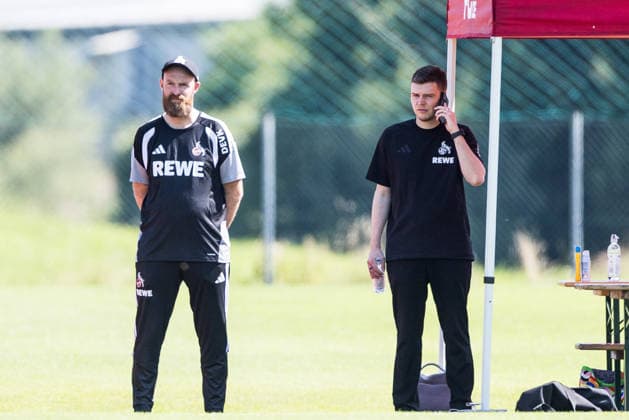 ST. JOHANN IN TIROL, AUSTRIA - JULY 29: Lukas Berg (Technical Director 1. FC Koeln) on the phone during a training session at trainings camp in Kitzbuehel of season 2026 27 at Koasastadion on July 29, 2026 in St. Johann in Tirol, Austria. Austria Copyright: xSteffiexWunderlx