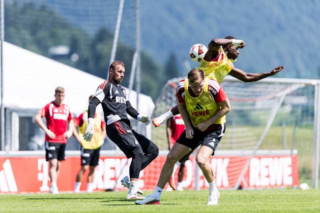 ST. JOHANN IN TIROL, AUSTRIA - JULY 29: Marvin Schwaebe (Schwäbe, Schwabe, 1. FC Koeln, 1) shooting the ball, hitting Ragnar Ache (1. FC Koeln, 9) during a training session at trainings camp in Kitzbuehel of season 2026 27 at Koasastadion on July 29, 2026 in St. Johann in Tirol, Austria. Austria Copyright: xSteffiexWunderlx