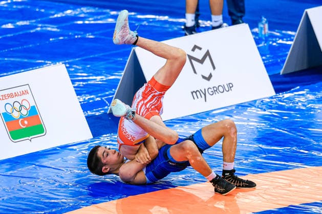 U17, U 17 Wrestling World Championships 45kg GR - Arsan Aliev (RUS) df. Vazgen Vardanyan (ARM) *** U17 Wrestling World Championships, 45 kg Greco-Roman: Arsan Aliev (RUS) defeated Vazgen Vardanyan (ARM) Copyright: xUnitedxWorldxWrestlingx xAmirrezx UWW-U17-WC-BAKU-2026