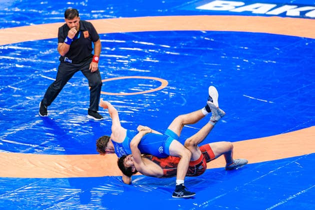 U17, U 17 Wrestling World Championships 71kg GR - Alinur Toleugali (KAZ) df. Bogdan Talmaci (MDA) *** U17 Wrestling World Championships, 71 kg Greco-Roman: Alinur Toleugali (KAZ) defeated Bogdan Talmaci (MDA) Copyright: xUnitedxWorldxWrestlingx xAmirrezx UWW-U17-WC-BAKU-2026