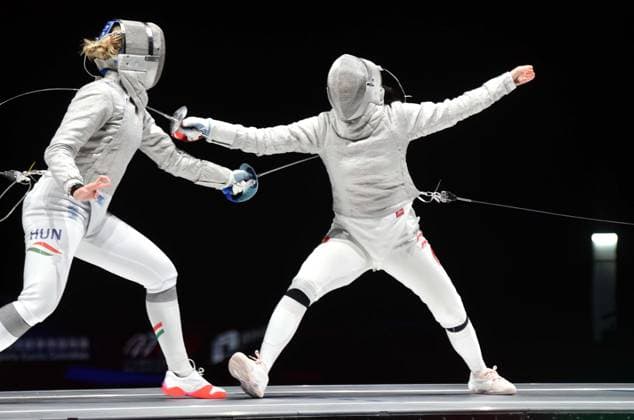 (260729) -- HONG KONG, July 29, 2026 -- Battai Sugar Katinka (L) of Hungary competes with Pan Qimiao of China during the women s team sabre final between China and Hungary at the 2026 Fencing World Championships in Hong Kong, south China, July 29, 2026. ) (SP)CHINA-HONG KONG-FENCING-WORLD CHAMPIONSHIPS-WOMEN S SABRE TEAM (CN) LoxPingxFai 