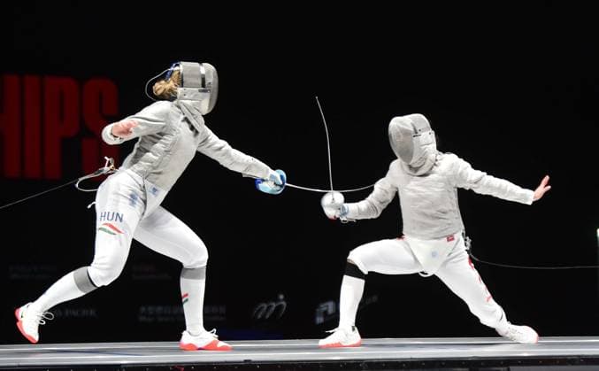 (260729) -- HONG KONG, July 29, 2026 -- Battai Sugar Katinka (L) of Hungary competes with Wei Jiayi of China during the women s team sabre final between China and Hungary at the 2026 Fencing World Championships in Hong Kong, south China, July 29, 2026. ) (SP)CHINA-HONG KONG-FENCING-WORLD CHAMPIONSHIPS-WOMEN S SABRE TEAM (CN) LoxPingxFai 