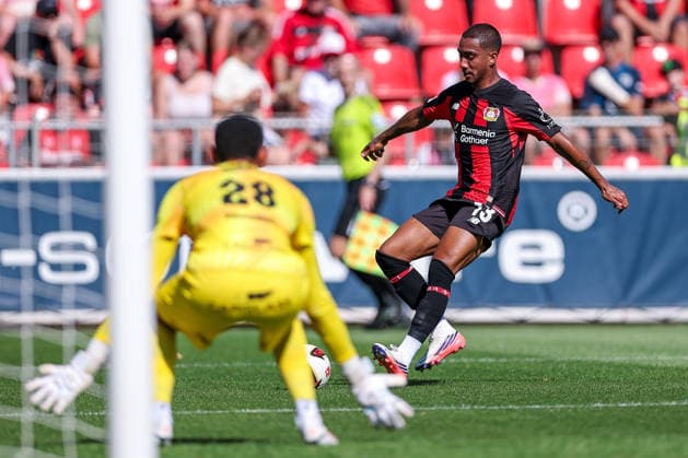 29.07.2026, Fußball, Bayer 04 Leverkusen - KRC Genk, Testspiel, Saison 2026 2027 im Ulrich-Haberland-Stadion: Arthur (Bayer04 Leverkusen 13) im beim Schuss gegen Torwart Lucca Brughmans (KRC Genk 28) DFB regulations prohibit any use of photographs as image sequences and or quasi-video. Nordrhein-Westfalen Deutschland *** July 29, 2026, Soccer, Bayer 04 Leverkusen vs. KRC Genk, Friendly Match, 2026–2027 season at Ulrich Haberland Stadium: Arthur of Bayer 04 Leverkusen takes a shot against goalkeeper Lucca Brughmans of KRC Genk, 28. DFB regulations prohibit any use of photographs as image sequences and or quasi-video. North Rhine-Westphalia, Germany