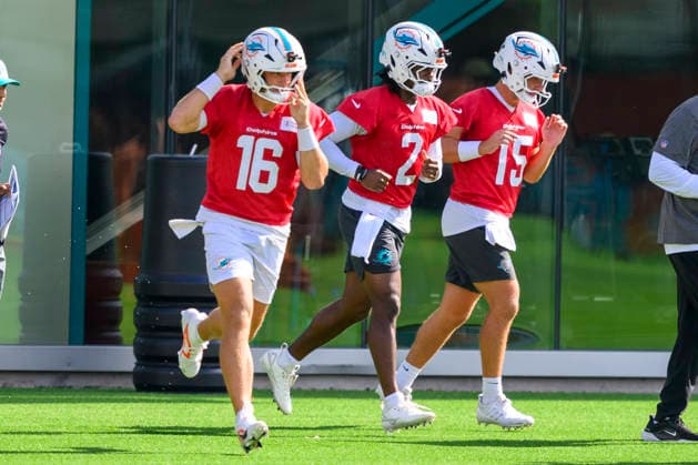 MIAMI GARDENS, FL - JULY 29: Miami Dolphins quarterbacks Mark Gronowski (16), Malik Willis (2) and Cam Miller (15) run onto the field during the Miami Dolphins Training Camp on August 29, 2026, at the Baptist Health Training Complex in Miami Gardens, FL. (Photo by Doug Murray Icon Sportswire) NFL, American Football Herren, USA JUL 29 Dolphins Training Camp EDITORIAL USE ONLY Icon796260729024