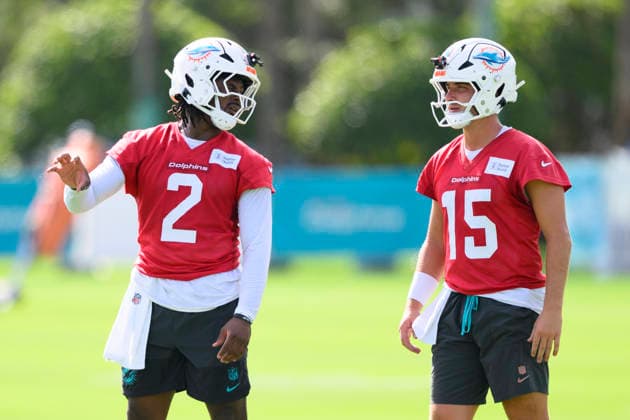 MIAMI GARDENS, FL - JULY 29: Miami Dolphins quarterback Malik Willis (2) talks with quarterback Cam Miller (15) on the field during the Miami Dolphins Training Camp on August 29, 2026, at the Baptist Health Training Complex in Miami Gardens, FL. (Photo by Doug Murray Icon Sportswire) NFL, American Football Herren, USA JUL 29 Dolphins Training Camp EDITORIAL USE ONLY Icon796260729028