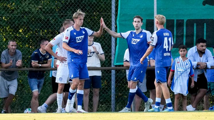 v.li.: Torschütze Max Moerstedt (Hoffenheim, 9), Arthur Chaves (Hoffenheim, 35), Oskar Hencke (Hoffenheim, 41), Spieler der TSG 1899 Hoffenheim, jubeln über das Tor zum 3:1, Jubel, Torjubel, Torerfolg, celebrate the goal, goal, celebration, jubelt ueber das Tor, Freuen, Freude, freut sich, optimistisch, positiv, Spielszene, Highlight, Action, Aktion, 29.07.2026, Zuzenhausen (Deutschland), Fussball, Testspiel, TSG 1899 Hoffenheim - Holstein Kiel, DFB DFL REGULATIONS PROHIBIT ANY USE OF PHOTOGRAPHS AS IMAGE SEQUENCES AND OR QUASI-VIDEO. *** From left: Goal scorer Max Moerstedt (Hoffenheim, 9), Arthur Chaves (Hoffenheim, 35), Oskar Hencke (Hoffenheim, 41), players from TSG 1899 Hoffenheim, celebrating the goal that made it 3–1, Celebration, goal celebration, goal scored, celebrating the goal, goal, celebration, celebrating the goal, joy, happiness, happy, optimistic, positive, game scene, highlight, action, 29 07 2026, Zuzenhausen, Germany, soccer, friendly match, TSG 1899 Hoffenheim vs. Holstein Kiel, DFB and DFL regulations prohibit any use of photographs as image sequences and or quasi-video xozx