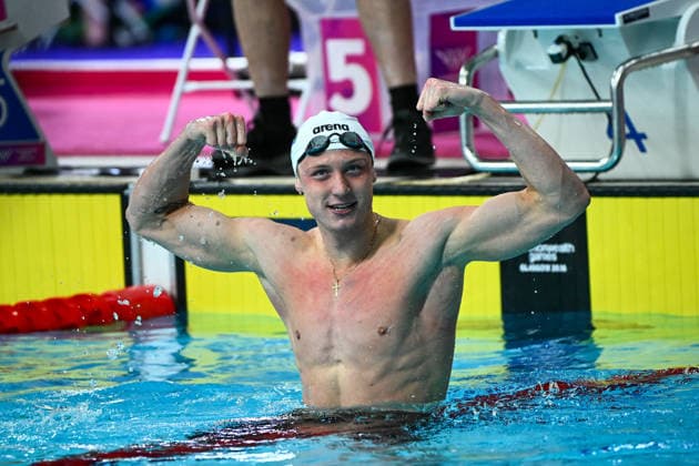 Glasgow 2026 Commonwealth Games Picture by Olly Hassell SWpix.com - 29 07 2026 - Glasgow 2026 Commonwealth Games - Swimming and Para Swimming - Tollcross International Swimming, Glasgow, Scotland - Men s 100m Backstroke Final - Pieter Coetze of South Africa wins the Men s 100m Backstroke Final Copyright: x xSWpix.comx(t axPhotographyxHubxLtd)xOllyxHassell SWpix.comx SWP-3419-0040