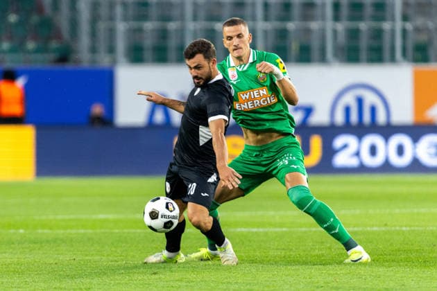SOCCER - UEFA ECL, Rapid vs Coloma VIENNA,AUSTRIA,29.JUL.26 - SOCCER - UEFA Conference League, qualification, SK Rapid Wien vs FC Santa Coloma. Image shows Guillaume Lopez (Coloma) aand Nenad Cvetkovic (Rapid).  GEPAxpictures xPhilippxBrem