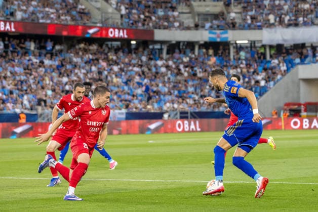 Aleksandre Amisulashvili of Iberia 1999 Tbilisi and Mykola Kukharevych of SK Slovan Bratislava seen during UEFA Champions league second qualifying round game between teams of SK Slovan Bratislava and Iberia 1999 Tbilisi (Dominika Kortvelyesiova Ball Raw Images) Bratislava Tehelne Pole stadium Slovakia Copyright: xDominikaxKortvelyesiovax DKOR8528