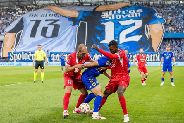 Giorgi Kobuladze of Iberia 1999 Tbilisi and Artur Gajdos of SK Slovan Bratislava seen during UEFA Champions league second qualifying round game between teams of SK Slovan Bratislava and Iberia 1999 Tbilisi (Dominika Kortvelyesiova Ball Raw Images) Bratislava Tehelne Pole stadium Slovakia Copyright: xDominikaxKortvelyesiovax DKOR8553