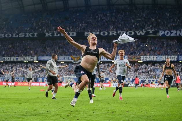 Tobias Bech of Aarhus GF celebrates after scoring the winning goal in the penalty shootout with teammates after qualifying for the UEFA Champions League Third Round Lech Poznan v Aarhus GF, UEFA Champions League Second Round Qualifier Second Leg, Football, Enea Stadion, Poznan, Poland, 29 07 2026 - 29 Jul 2026Poznan ENEA Stadion Poland  Copyright: xHanc WiredxPhotos Shutterstockx 17026455n