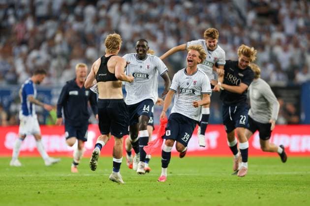 Tobias Bech of Aarhus GF celebrates after scoring the winning goal in the penalty shootout with teammates after qualifying for the UEFA Champions League Third Round Lech Poznan v Aarhus GF, UEFA Champions League Second Round Qualifier Second Leg, Football, Enea Stadion, Poznan, Poland, 29 07 2026 - 29 Jul 2026Poznan ENEA Stadion Poland  Copyright: xHanc WiredxPhotos Shutterstockx 17026455j