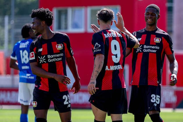 29.07.2026, Fußball, Bayer 04 Leverkusen - KRC Genk, Testspiel, Saison 2026 2027 im Ulrich-Haberland-Stadion: Torjubel nach dem Tor durch Torschütze Afonso Moreira (Bayer04 Leverkusen 09) zusammen mit Nathan Tella (Bayer04 Leverkusen 23) Christian Kofane (Bayer04 Leverkusen 35) DFB regulations prohibit any use of photographs as image sequences and or quasi-video. Nordrhein-Westfalen Deutschland *** July 29, 2026, Soccer, Bayer 04 Leverkusen vs. KRC Genk, Friendly Match, 2026–2027 season at Ulrich Haberland Stadium; goal celebration after the goal scored by Afonso Moreira (Bayer 04 Leverkusen 09) together with Nathan Tella (Bayer 04 Leverkusen 23) and Christian Kofane (Bayer 04 Leverkusen 35); DFB regulations prohibit any use of photographs as image sequences and or quasi-video. North Rhine-Westphalia, Germany