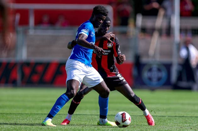 29.07.2026, Fußball, Bayer 04 Leverkusen - KRC Genk, Testspiel, Saison 2026 2027 im Ulrich-Haberland-Stadion: Aaron Bibout (KRC Genk 23) im Zweikampf gegen Abdoulaye Faye (Bayer04 Leverkusen 32) DFB regulations prohibit any use of photographs as image sequences and or quasi-video. Nordrhein-Westfalen Deutschland *** July 29, 2026, Soccer, Bayer 04 Leverkusen vs. KRC Genk, Friendly Match, 2026–2027 season at Ulrich Haberland Stadium; Aaron Bibout (KRC Genk, 23) in a tackle against Abdoulaye Faye (Bayer 04 Leverkusen, 32); DFB regulations prohibit any use of photographs as image sequences and or quasi-video; North Rhine-Westphalia, Germany