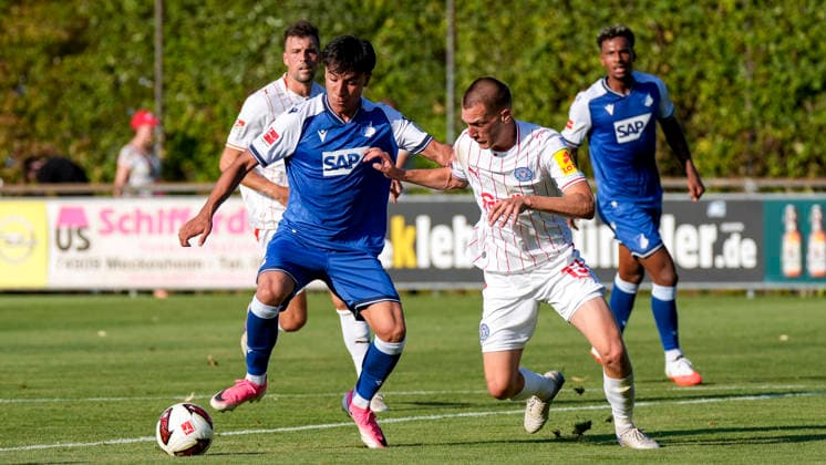 v.li.: Deniz Zeitler (Hoffenheim, 38), Ivan Nekic (Kiel, 13), Zweikampf, Spielszene, Duell, duel, tackle, tackling, Dynamik, Action, Aktion, 29.07.2026, Zuzenhausen (Deutschland), Fussball, Testspiel, TSG 1899 Hoffenheim - Holstein Kiel, DFB DFL REGULATIONS PROHIBIT ANY USE OF PHOTOGRAPHS AS IMAGE SEQUENCES AND OR QUASI-VIDEO. *** v li Deniz Zeitler Hoffenheim, 38, Ivan Nekic Kiel, 13, tackle, game scene, duel, tackle, tackling, dynamics, action, 07 29 2026, Zuzenhausen, Germany, soccer, friendly match, TSG 1899 Hoffenheim vs. Holstein Kiel, DFB and DFL regulations prohibit any use of photographs as image sequences and or quasi-video xozx