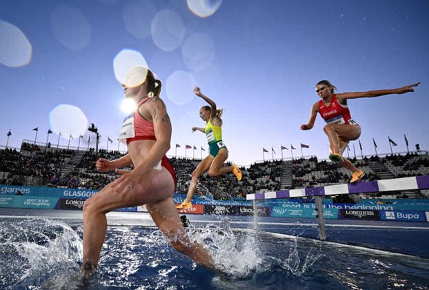 COM26 ATHLETICS, Cara Feain-Ryan of Australia (C) competes during the Women™s 3000m Final during the Glasgow 2026 Commonwealth Games at Scotstoun Stadiumin Glasgow, Scotland, Wednesday, July 29, 2026. ( NO ARCHIVING, EDITORIAL USE ONLY Glasgow Scotland United Kingdom  Copyright: xJOELxCARRETTx 20260730133070316235