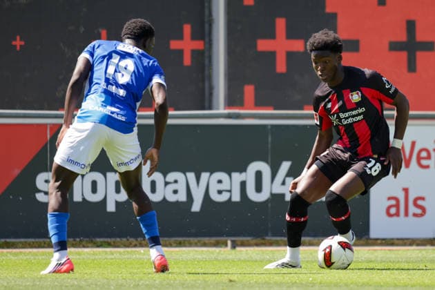 29.07.2026, xgrfx, Fussball Testspiel, Bayer 04 Leverkusen - KRC Genk v.l. Yaimar Medina (KRC Genk), Axel Tape (Bayer Leverkusen) (DFL DFB REGULATIONS PROHIBIT ANY USE OF PHOTOGRAPHS as IMAGE SEQUENCES and or QUASI-VIDEO) Leverkusen *** July 29, 2026, xgrfx, soccer friendly match, Bayer 04 Leverkusen vs. KRC Genk, Yaimar Medina (KRC Genk), Axel Tape (Bayer Leverkusen). DFL and DFB regulations prohibit any use of photographs as image sequences and or quasi-video. Leverkusen