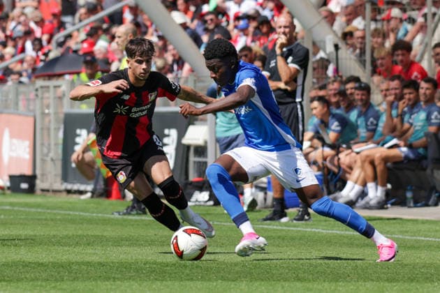 29.07.2026, xgrfx, Fussball Testspiel, Bayer 04 Leverkusen - KRC Genk v.l. Afonso Moreira (Bayer Leverkusen), Emmanuel Sarfo (KRC Genk) (DFL DFB REGULATIONS PROHIBIT ANY USE OF PHOTOGRAPHS as IMAGE SEQUENCES and or QUASI-VIDEO) Leverkusen *** July 29, 2026, xgrfx, Soccer Friendly Match, Bayer 04 Leverkusen vs. KRC Genk, featuring Afonso Moreira (Bayer Leverkusen) and Emmanuel Sarfo (KRC Genk). DFL and DFB regulations prohibit any use of photographs as image sequences and or quasi-video. Leverkusen