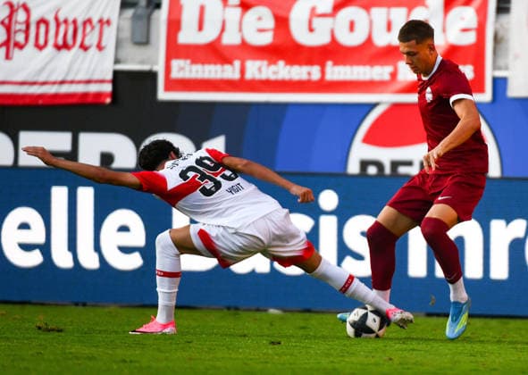29.07.2026, xpsx, Fussball Testspiel, Kickers Offenbach - VfB Stuttgart v.l. Ertugrul Yigit (VfB Stuttgart), Jan Becker (Offenbacher Kickers) (DFL DFB REGULATIONS PROHIBIT ANY USE OF PHOTOGRAPHS as IMAGE SEQUENCES and or QUASI-VIDEO) emspor Offenbach *** July 29, 2026, xpsx, Soccer Friendly Match, Kickers Offenbach vs. VfB Stuttgart, Ertugrul Yigit (VfB Stuttgart), Jan Becker, Offenbach Kickers; DFL and DFB regulations prohibit any use of photographs as image sequences and or quasi-video; emspor Offenbach