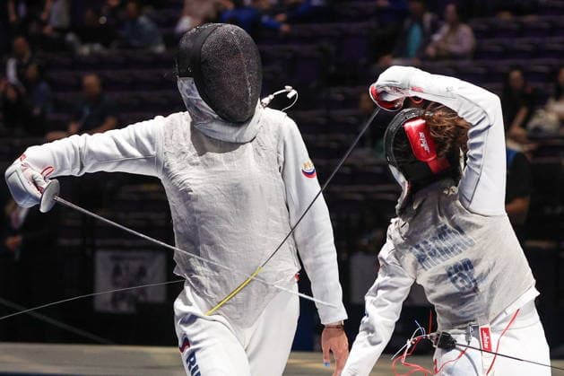 CHINA, HONG KONG - JULY 30, 2026: Athlete Anna Solovyova of Russia fights in her team foil bout against Maria Marino of Spain during the 2026 Kerry Fencing World Championships. Mikhail Sinitsyn TASS  95618939