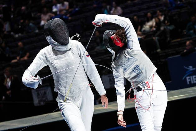 CHINA, HONG KONG - JULY 30, 2026: Athlete Anna Solovyova of Russia fights in her team foil bout against Maria Marino of Spain during the 2026 Kerry Fencing World Championships. Mikhail Sinitsyn TASS  95618941