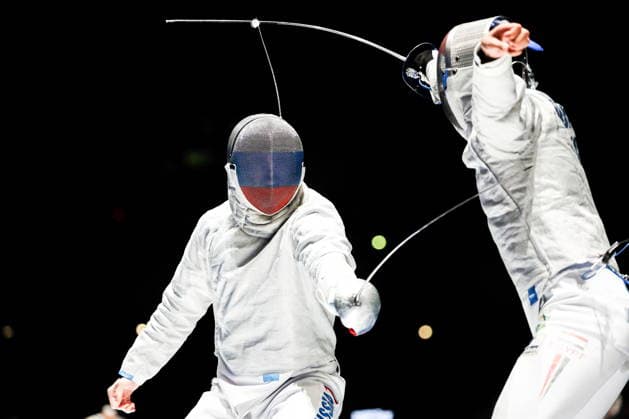 CHINA, HONG KONG - JULY 30, 2026: Athlete Dmitry Nasonov of Russia fights in his team sabre bout against Adham Moataz of Egypt during the 2026 Kerry Fencing World Championships. Mikhail Sinitsyn TASS  95619064