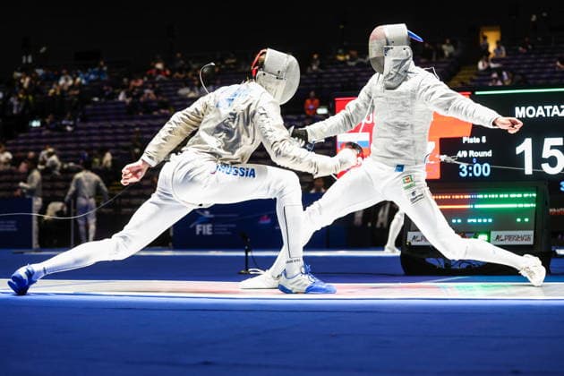 CHINA, HONG KONG - JULY 30, 2026: Athletes Dmitry Nasonov (L) of Russia and Adham Moataz of Egypt fight in their team sabre bout during the 2026 Kerry Fencing World Championships. Mikhail Sinitsyn TASS  95619071