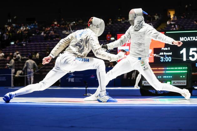 CHINA, HONG KONG - JULY 30, 2026: Athletes Dmitry Nasonov (L) of Russia and Adham Moataz of Egypt fight in their team sabre bout during the 2026 Kerry Fencing World Championships 2026 Fencing World Championships In Hong Kong  - ZUMAt113 20260730_zaa_t113_047 Copyright: xMikhailxSinitsynx
