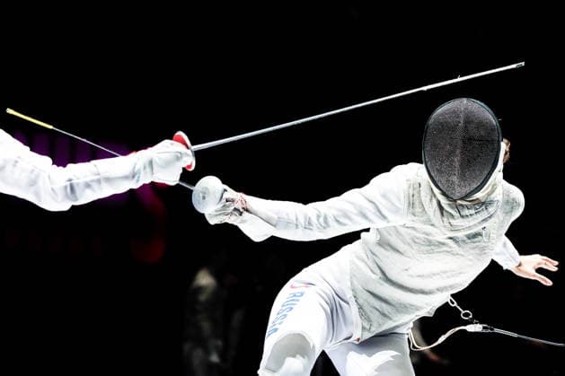 CHINA, HONG KONG - JULY 30, 2026: Athlete Vladislava Peniushkina of Russia fights in her team foil bout against Sera Azuma of Japan during the 2026 Kerry Fencing World Championships. Mikhail Sinitsyn TASS  95619636