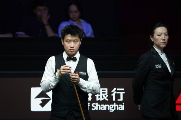 SHANGHAI, CHINA - JULY 30: Zhao Xintong of China chalks the cue in the Quarterfinal match against Neil Robertson of Australia on Day 4 of the 2026 Snooker Shanghai Masters at Luwan Gymnasium on July 30, 2026 in Shanghai, China.  Copyright: xTaixChengzhex 111657238304