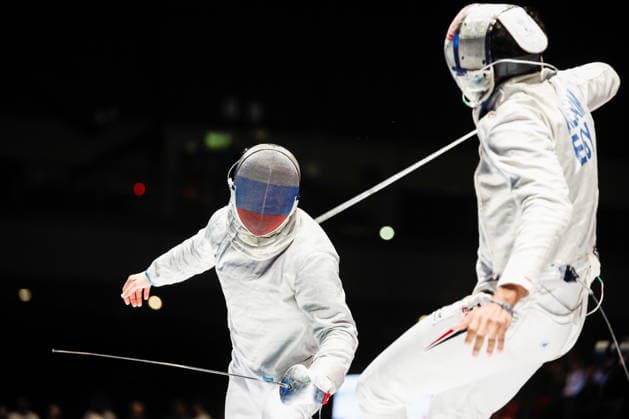 CHINA, HONG KONG - JULY 30, 2026: Athlete Dmitry Nasonov of Russia fights in his team sabre bout against Ahmed Hesham of Egypt during the 2026 Kerry Fencing World Championships. Mikhail Sinitsyn TASS  95619881