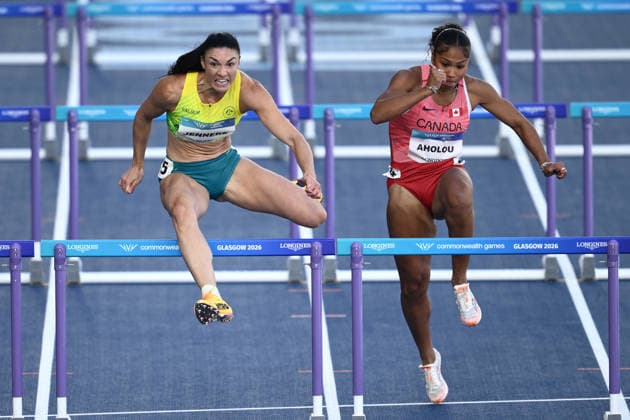 COM26 ATHLETICS, Michelle Jenneke of Australia (left) competes in the Women s 100m Hurdles Heats during the Glasgow 2026 Commonwealth Games at Scotstoun Stadium in Glasgow, Scotland, Thursday, July 30, 2026. ( NO ARCHIVING, EDITORIAL USE ONLY Glasgow United Kingdom  Copyright: xJOELxCARRETTx 20260730156373105135